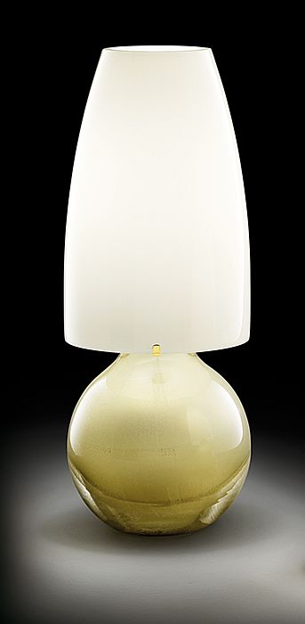 The Argea table light from Venini with gold or silver finish