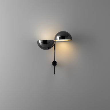 Metal cut sphere composition wall light