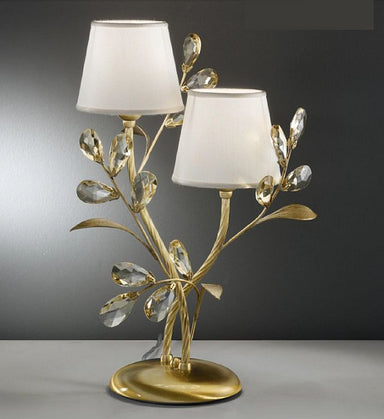 Light amber Scholer crystal table light with cream shades