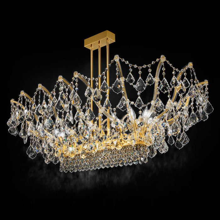 Gold-framed rectangular ceiling light with clear crystal swags and pendant drops against a black background.