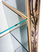 Decorative glass shelf with gold frame and leaf pattern on a white background