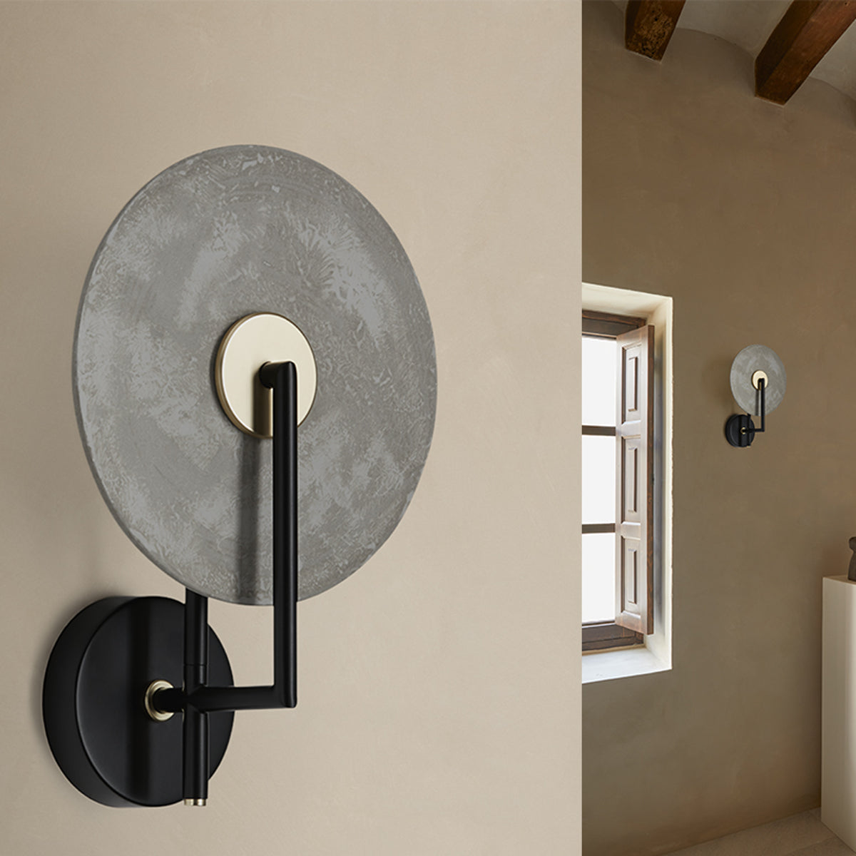 Modern black steel and glass disc wall light