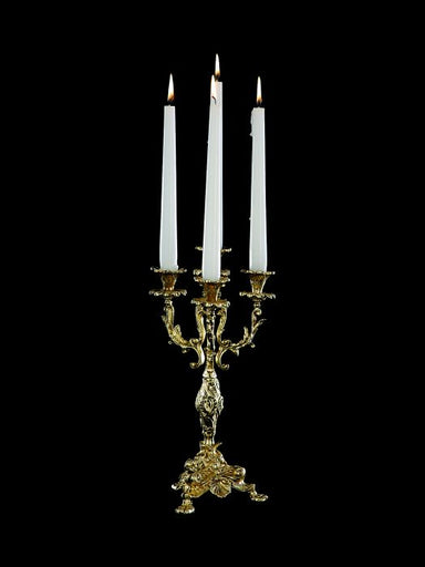 Antiqued 24 carat gold and brass four arm candelabra
