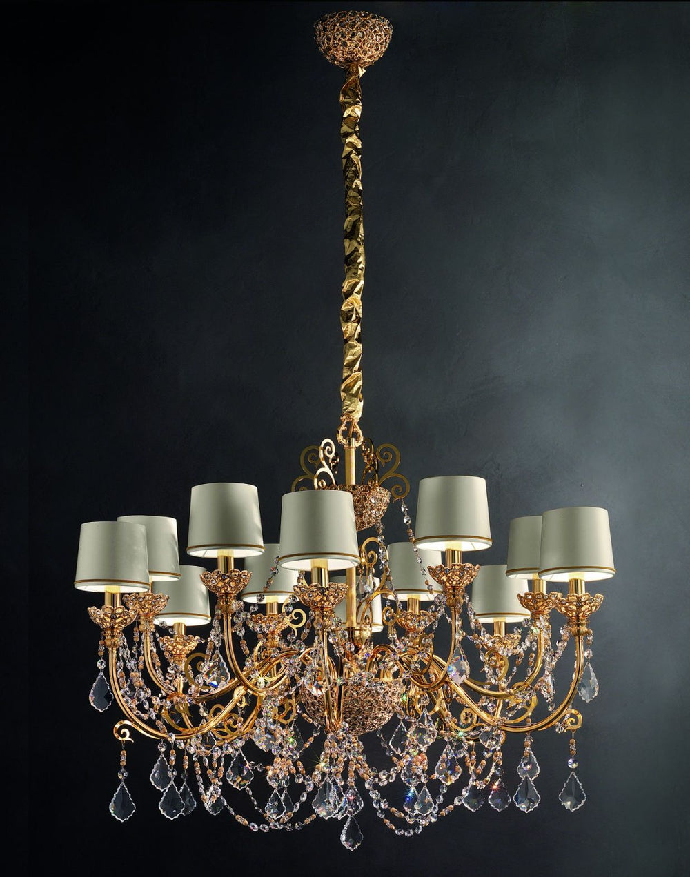 A lovely traditional 12-light crystal-encrusted Italian chandelier with premium pendants
