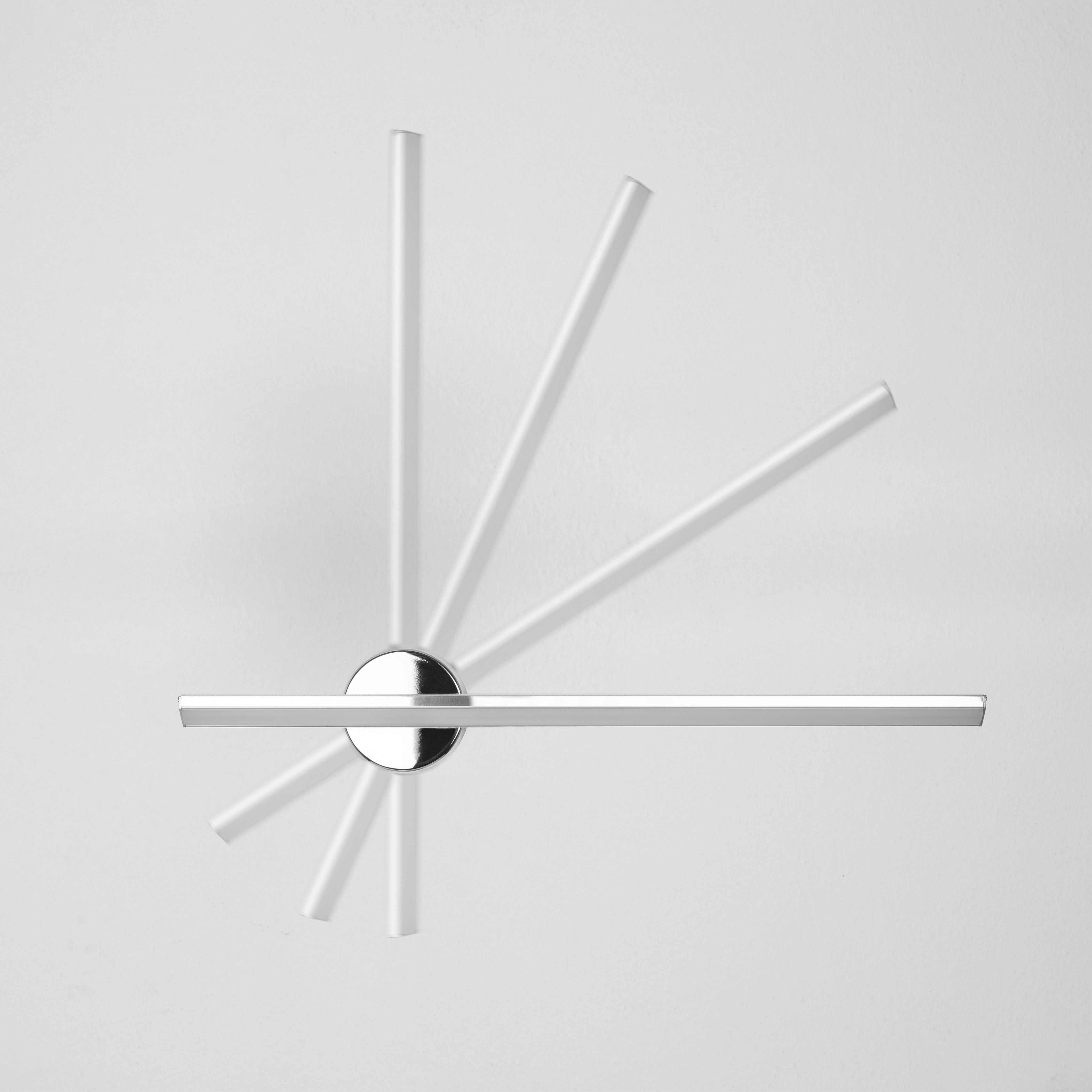 Rotating modern metal wall light by Ledevo