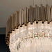 Modern metal and rock crystal chandelier with custom frame finish