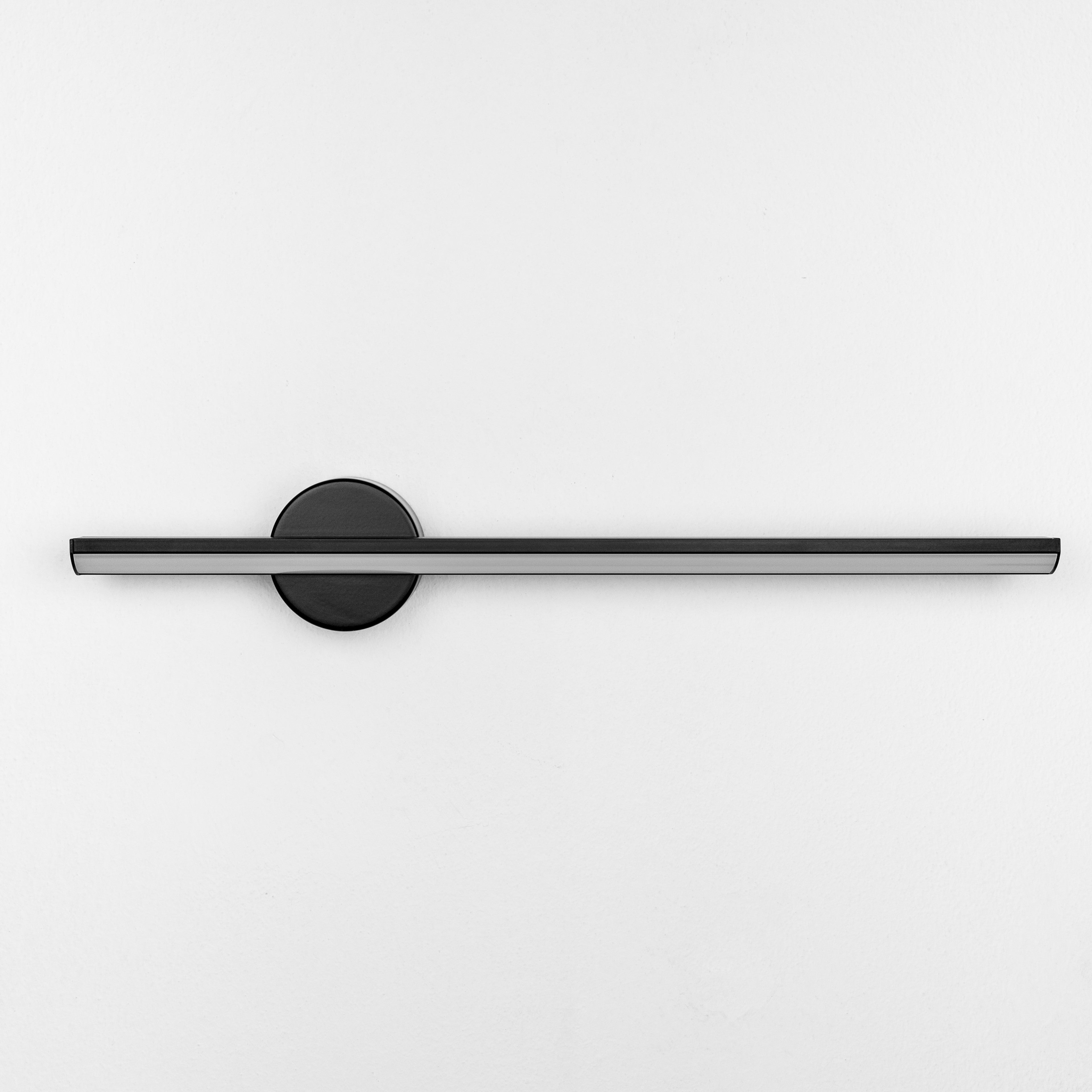 Rotating modern metal wall light by Ledevo