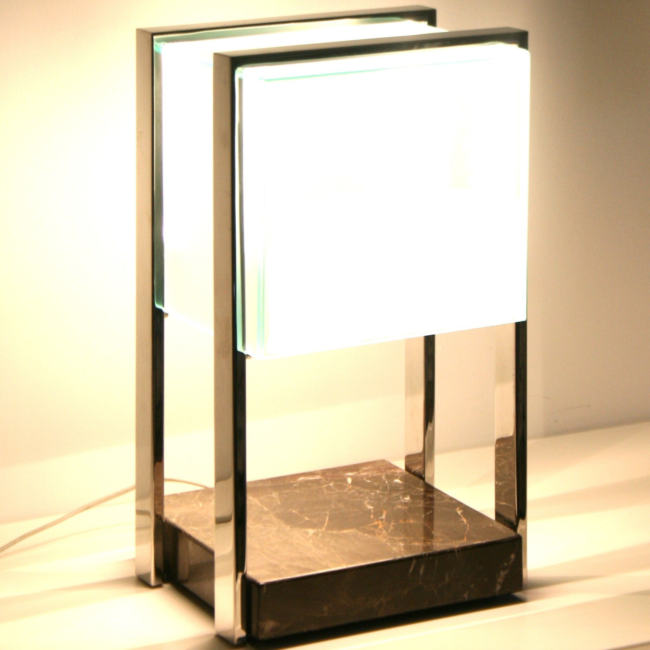 Frosted Glass Encased With Metal Frame And Marble Base By LedevÃ²