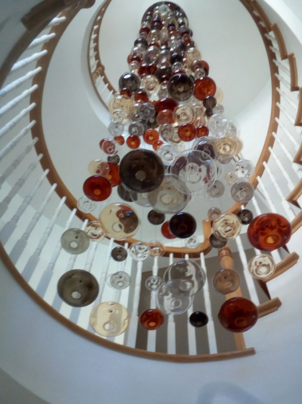 20 Feet Tall Bespoke Stairwell Chandelier With Colored Glass Bubbles