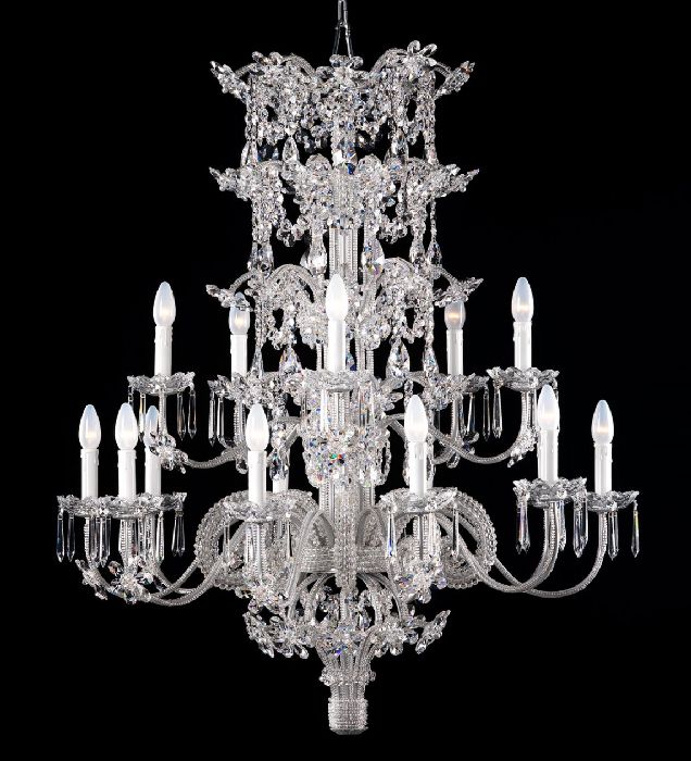 Large silver chandeliers with crystal pendants