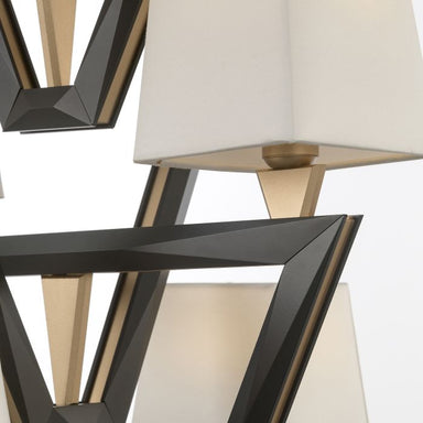 Striking gold and black chandelier with a modern art deco feel