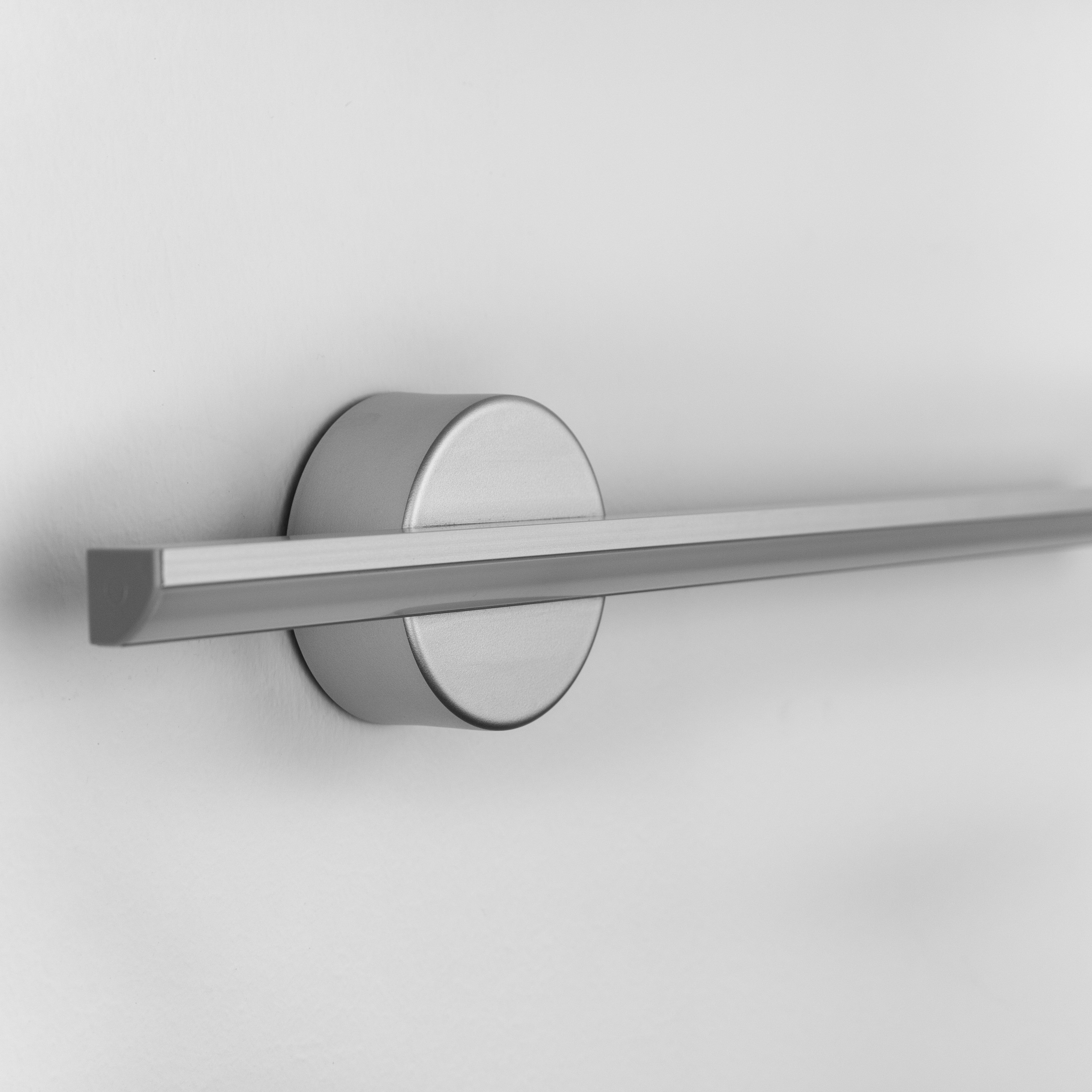 Rotating modern metal wall light by Ledevo