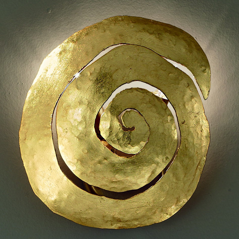Traditional hand-forged and gilded wall light